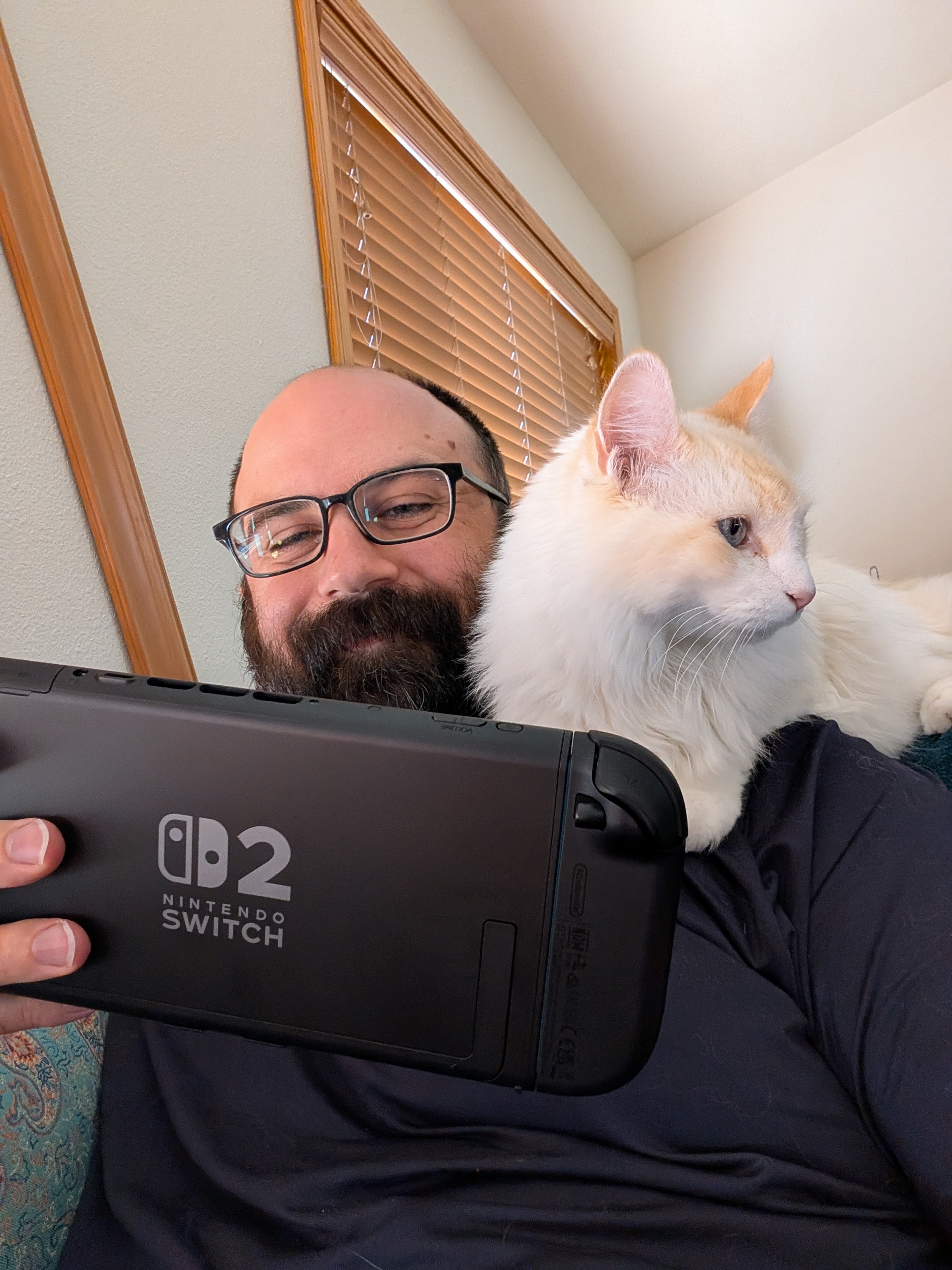 Photo of my cat on my shoulder